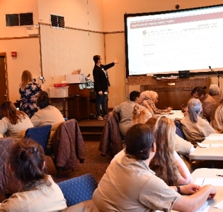 Amy Doty, dean of correctional education at Southeast Community College, presents a test at the Nebraska Correctional Center for Women in York.